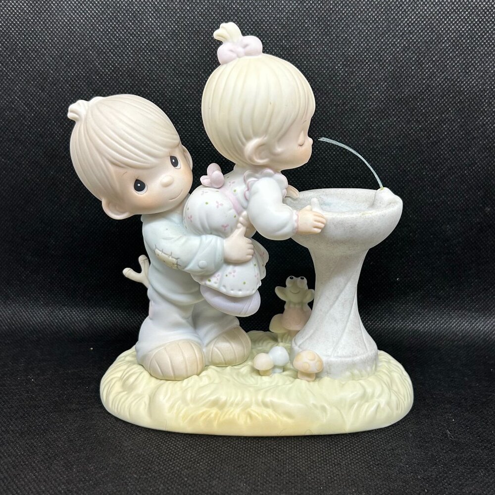 Precious Moments "Your Love is so Uplifting" figurine